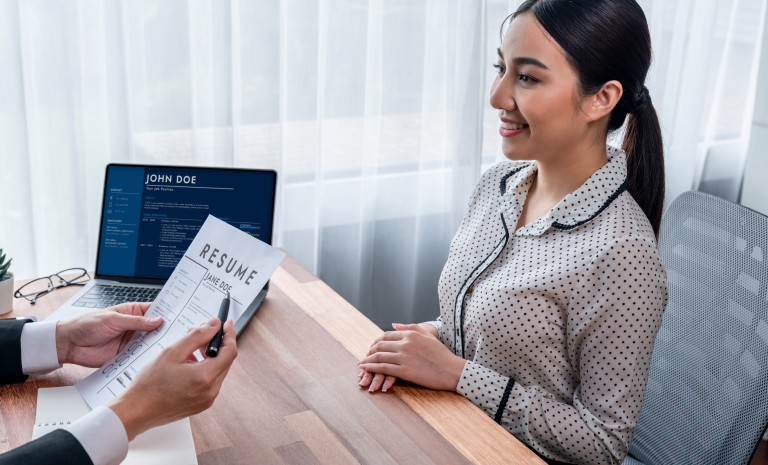 Employer Reviewing A Domestic Worker's Cv In Dubai - Imdad Center